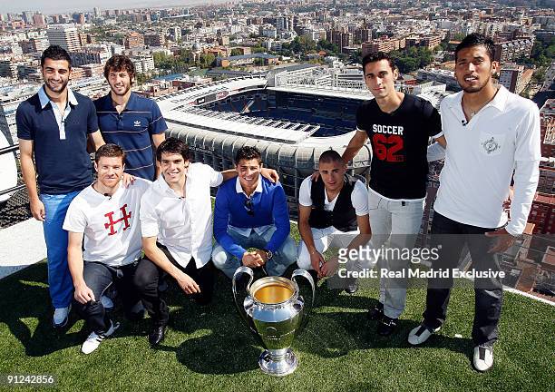 Raul Albiol, Esteban Granero, Xabi Alonso, Kaka, Cristiano Ronaldo, Karim Benzema, Alvaro Arbeloa and Ezequiel Garay of Real Madrid poses with a...