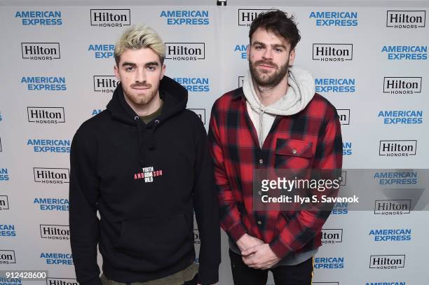 Musicians Andrew Taggart and Alex Pall of The Chainsmokers enjoy a unique experience at the Hilton and American Express event at the Conrad New York...