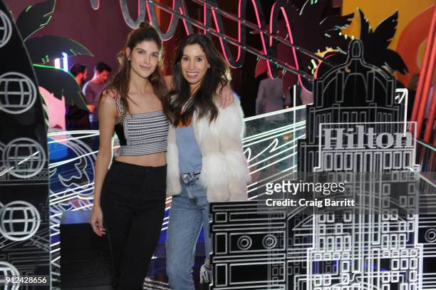 Influencer Aly Weisman and guest enjoy a unique experience at the Hilton and American Express event at the Conrad New York on January 30, 2018 in New...