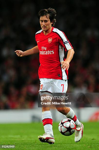 Tomas Rosicky of Arsenal in action during the UEFA Champions League Group H match between Arsenal and Olympiakos at the Emirates Stadium on September...