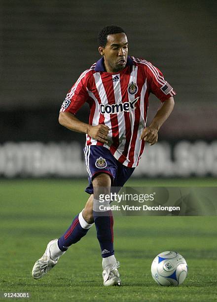 Maykel Galindo of Chivas USA paces the ball on the attack against Chivas de Guadalajara during the International Club Friendly at the Rose Bowl on...