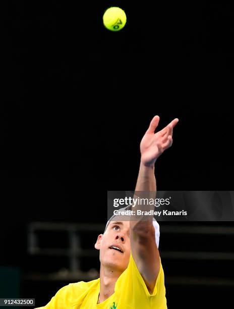 Alex de Minaur of Australia serves during a practice session ahead of the Davis Cup World Group First Round tie between Australia and Germany at Pat...