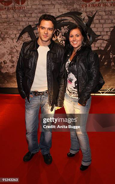 Actor Felix Isenbuegel and actress Sarah Tkotsch attend the premiere of 'Gangs'at the Kulturbrauereion September 29, 2009 in Berlin, Germany.