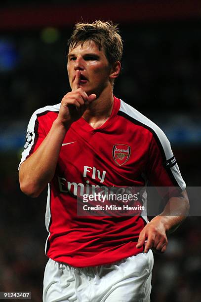 Andrey Arshavin of Arsenal celebrates scoring the second goal during the UEFA Champions League Group H match between Arsenal and Olympiakos at the...