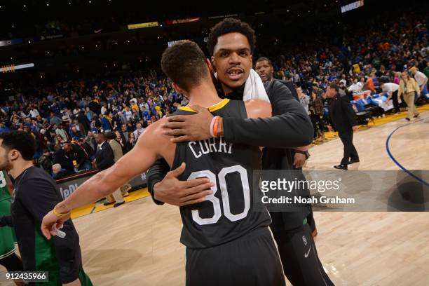 Stephen Curry of the Golden State Warriors and Jarell Eddie of the Boston Celtics exchange a hug after the game between the two teams on January 27,...