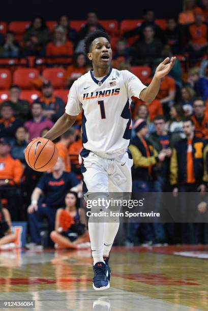 Illinois Fighting Illini Guard Trent Frazier motions to teammates as he brings the ball up the court during the Big Ten Conference college basketball...