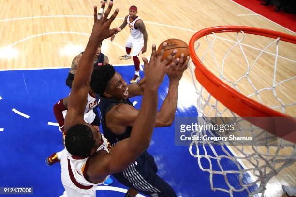 Stanley Johnson of the Detroit Pistons drives to the basket past Tristan Thompson of the Cleveland Cavaliers during the first half at Little Caesars...