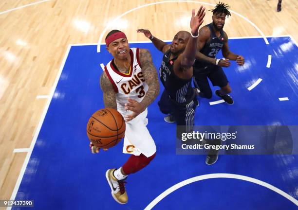 Isaiah Thomas of the Cleveland Cavaliers tries to get a shot off past Anthony Tolliver of the Detroit Pistons during the second half at Little...