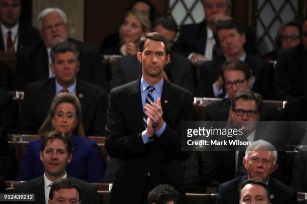 Sen. Tom Cotton applauds during the State of the Union address in the chamber of the U.S. House of Representatives January 30, 2018 in Washington,...