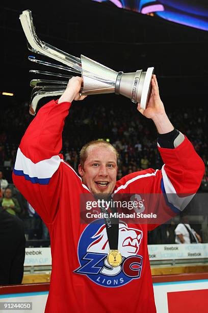 Mathias Seger the captain of Zurich lifts the Victoria Cup after his team's 2-1 victory during the ZSC Lions Zurich v Chicago Blackhawks Victoria Cup...