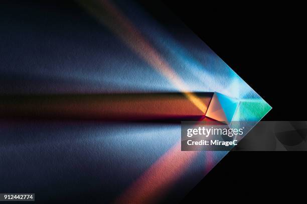 powerful and colorful light refraction - arrow abstract stock pictures, royalty-free photos & images