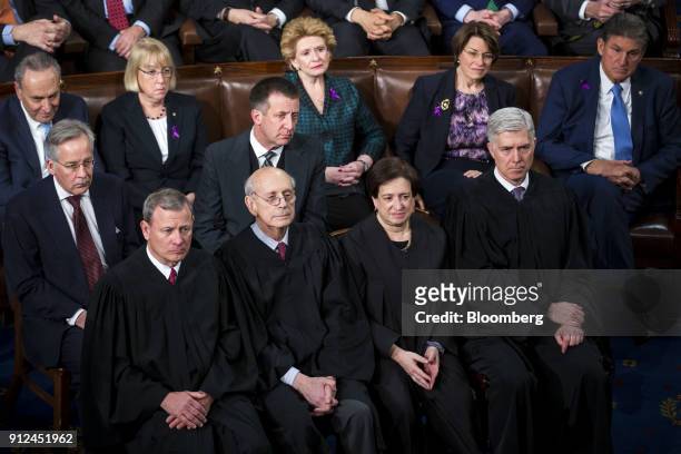The Supreme Court Justices, from bottom left, Chief Justice John Roberts, Stephen Breyer, Elena Kagan, and Neil Gorsuch listen during a State of the...