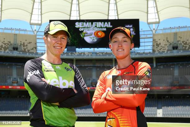 Alex Blackwell of the Sydney Thunder and Emily Smith of the Scorchers pose during a media opportunity ahead of the Big Bash League semi finals at...