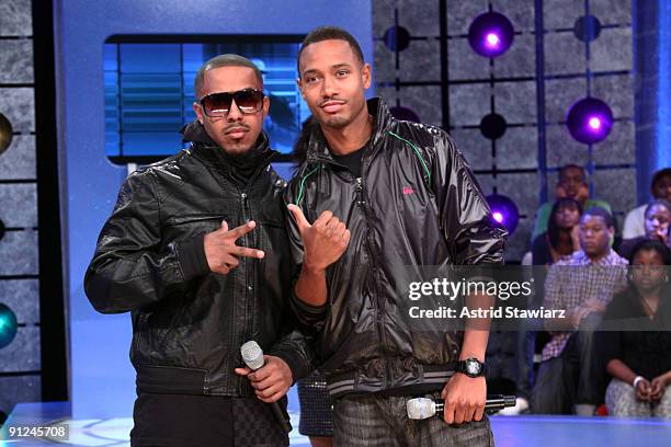 Singer Marques Houston poses for photos with host Terrence J. At BET's '106 & Park' at BET Studios on September 28, 2009 in New York City.