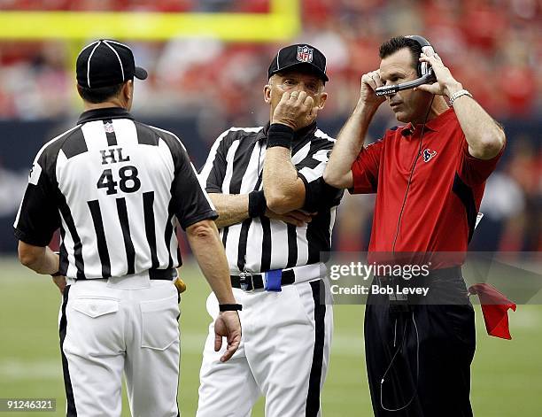 Head coach Gary Kubiak of the Houston Texans challenges a late-game fumble call during the game against the Jacksonville Jaguars at Reliant Stadium...