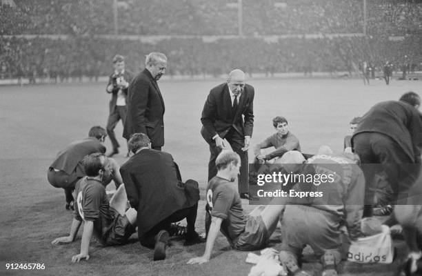 Manchester United FC manager Matt Busby instructing team before extra time at the European Cup Final at Wembley against SL Benfica, London, UK, 29th...