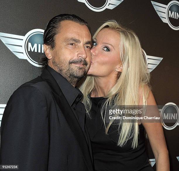 Former tennis star Henri Leconte and his wife Florentine Leconte attend the Mini Austin 50th Anniversary party at Piscine Molitor on September 29,...