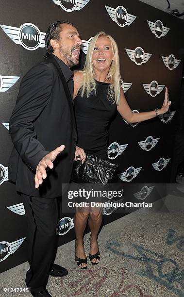 Former tennisman Henri Leconte and his wife Florentine Leconte attend the Mini Austin 50th Anniversary party at Piscine Molitor on September 29, 2009...
