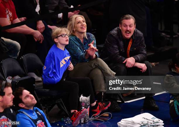 Anderson Falco and Edie Falco attend the New York Knicks vs Brooklyn Nets game at Madison Square Garden on January 30, 2018 in New York City.