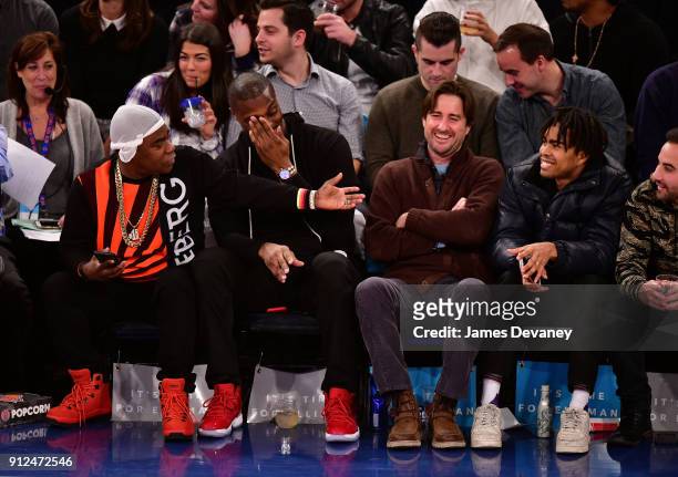 Tracy Morgan, Plaxico Burress, Luke Wilson and guest attend the New York Knicks vs Brooklyn Nets game at Madison Square Garden on January 30, 2018 in...