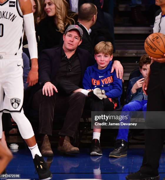 Ed Burns and Finn Burns attend the New York Knicks vs Brooklyn Nets game at Madison Square Garden on January 30, 2018 in New York City.