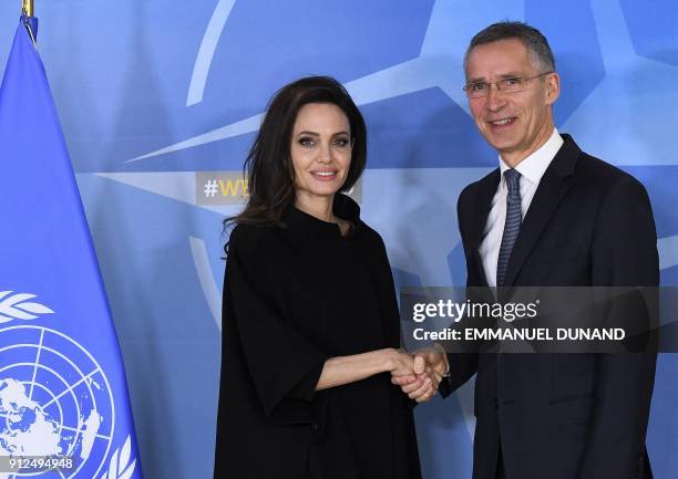 Secretary General Jens Stoltenberg welcomes US actress and Special Envoy for the United Nations High Commissioner for Refugees Angelina Jolie at the...