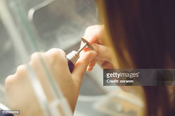 grinding dental implants - crown moulding stock pictures, royalty-free photos & images