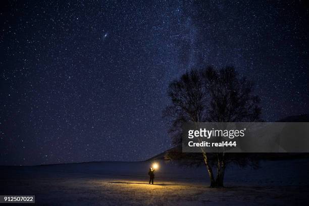 milky way in the galaxy - flashlight stock pictures, royalty-free photos & images