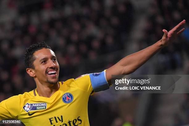 Paris Saint-Germain's Brazilian defender Marquinhos celebrates after scoring a goal during the French League Cup football semi-final match between...