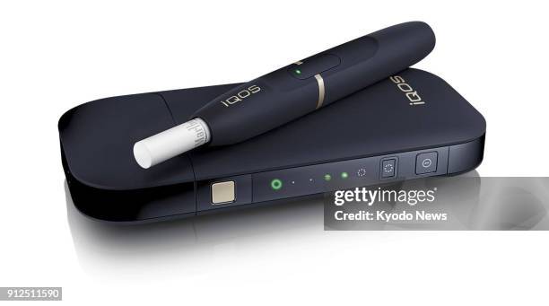 Undated file photo shows Philip Morris International Inc.'s heat-not-burn tobacco product iQOS. ==Kyodo