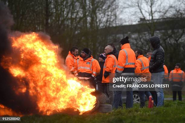 Workers of the Ascoval steel factory of Saint-Saulve, a branch of conglomerate Ascometal and Vallorec, burn tires as they stage a protest by the A2...