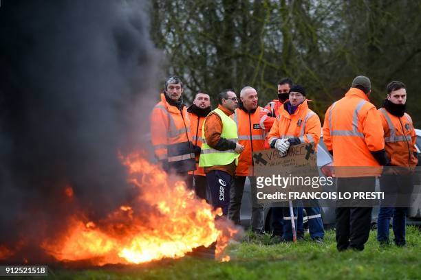 Workers of the Ascoval steel factory of Saint-Saulve, a branch of conglomerate Ascometal and Vallorec, burn tires as they stage a protest by the A2...