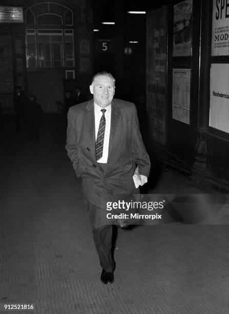 Tottenham Hotspur manager Bill Nicholson hurries out of Preston Station as he tries to make his way to Deepdale to catch the FA Cup replay match...