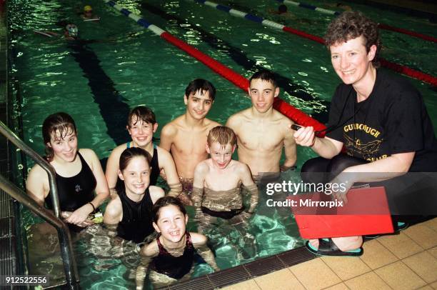 Members of the Guisborough Swimming Club who have been chosen for a gala. The clubs head coach Barbara Blades is pictured with Carole Blades, Helen...