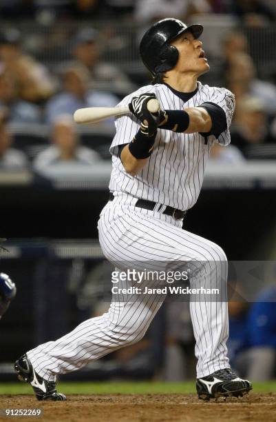 Hideki Matsui of the New York Yankees flies out against the Kansas City Royals during the game on September 29, 2009 at Yankee Stadium in the Bronx...