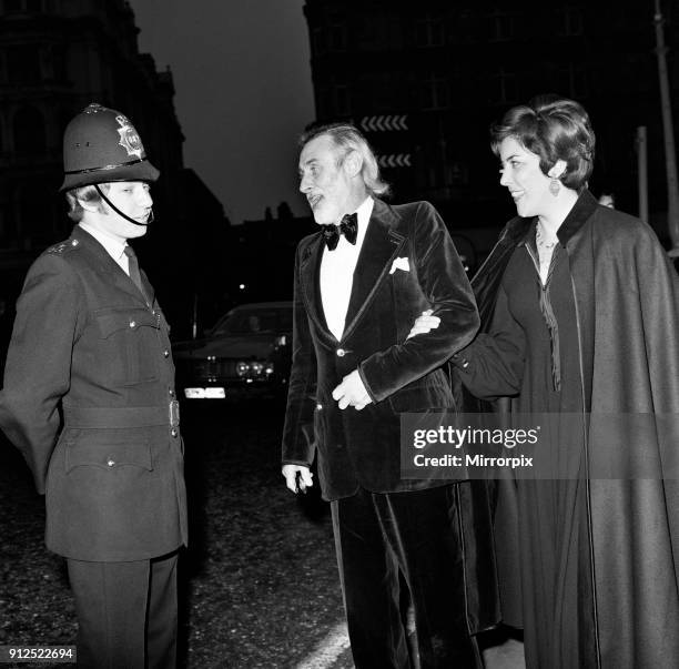 The Royal Film Performance of 'The Three musketeers' at the Odeon Leicester Square, London. Spike Milligan with his wife Paddy Milligan, talking to a...
