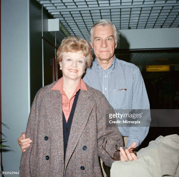 Angela Lansbury and husband Peter Shaw at London Airport, 13th March 1990.