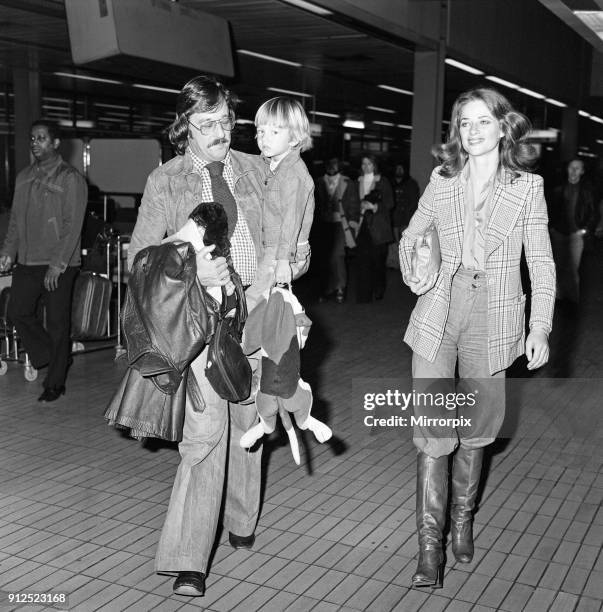 Charlotte Rampling at Heathrow Airport with her son Barnaby and husband Bryan Southcombe, 6th March 1976.