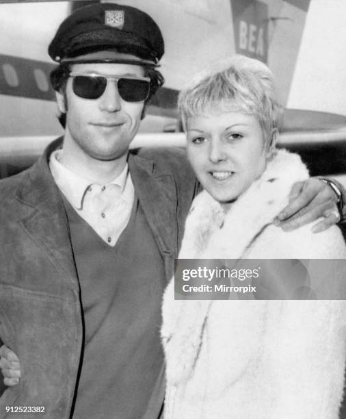 Welsh singing star Tom Jones pictured with his wife Linda after arriving from France, 8th April 1965.