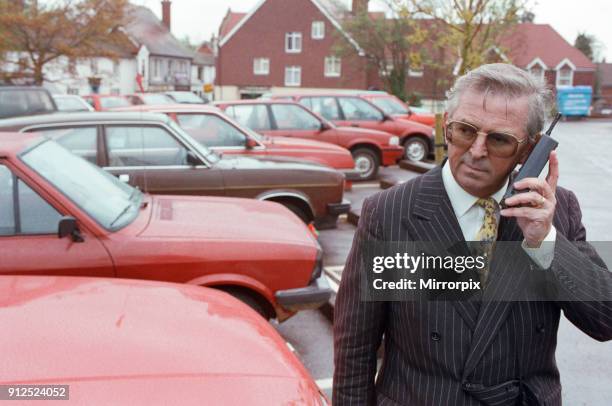 Daily Mirror reporter Harry Arnold photographed in connection to an article about small a electronic box, known as an 'Interceptor' which opens...