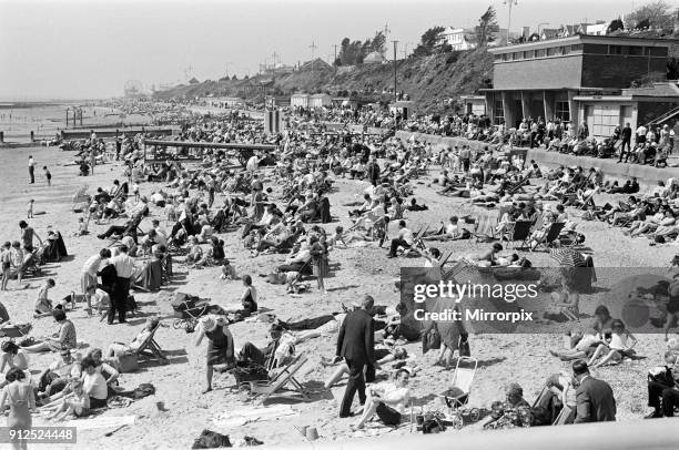 Holiday scenes in Brighton, East Sussex on the Whitsun bank holiday, 15th May 1964.