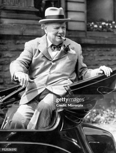 Winston Churchill smiles at the cheering crowds as he leaves the Town Hall on his visit to Wolverhampton, 25th July 1949.