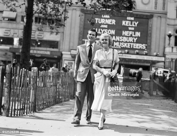 Angela Lansbury and Peter Shaw, pictured walking in Leicester Square, London 26th July 1949.