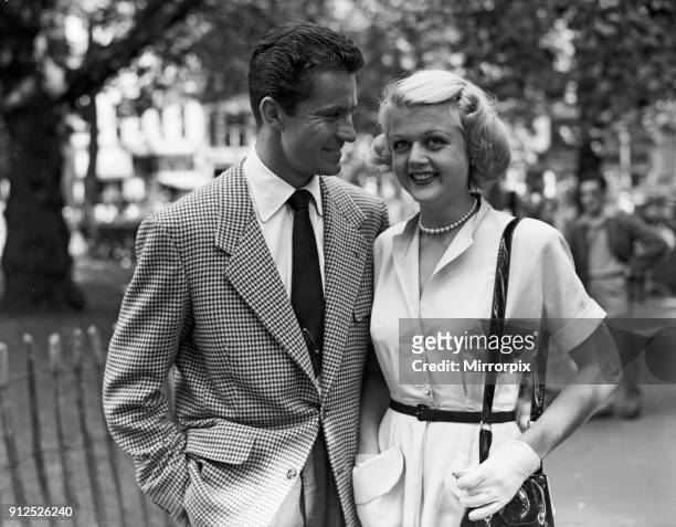 Angela Lansbury and Peter Shaw, who are in London for their wedding, 26th July 1949.
