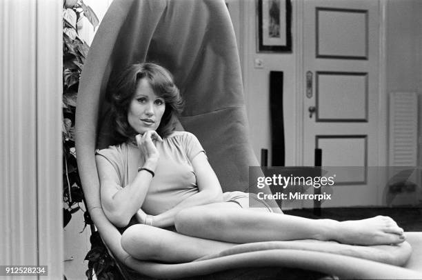 Fiona Richmond, model and actress, pictured at her flat in London, 1st August 1976.