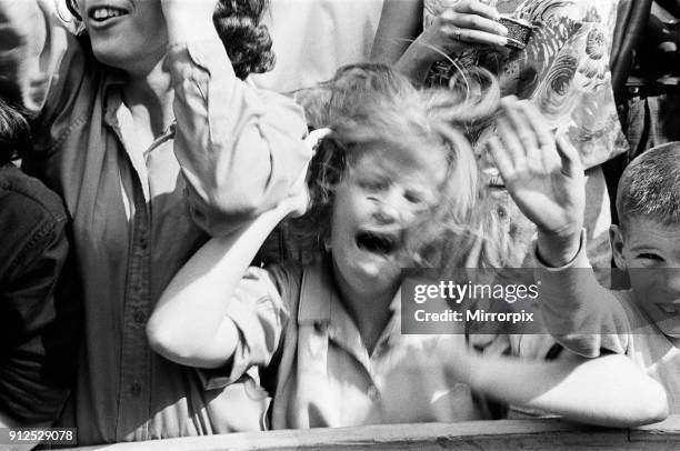 The Beatles in New York City, on their North American Tour ahead of their concert to be held at Forest Hills. Cheering fans gathered outside the...