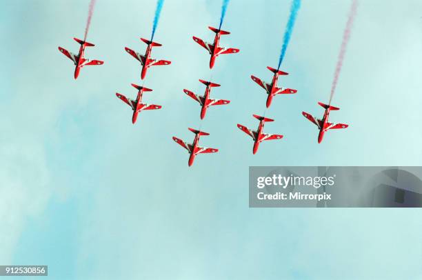 The Red Arrows, RAF Aerobatic Team, performing at the 1993 500 CC British Motorcycle Grand Prix, Donington Park, 1st August 1993.