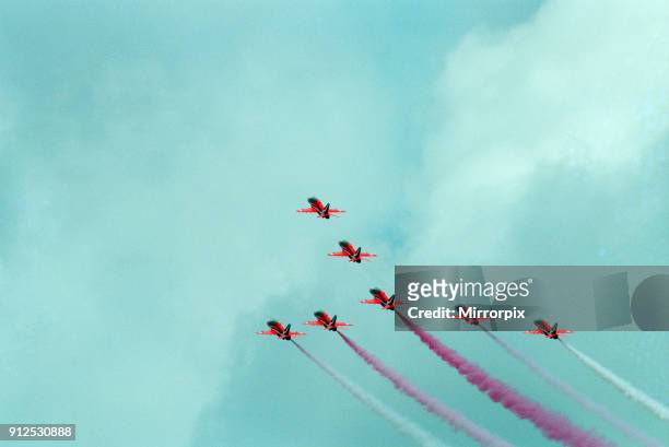 The Red Arrows, RAF Aerobatic Team, performing at the 1993 500 CC British Motorcycle Grand Prix, Donington Park, 1st August 1993.