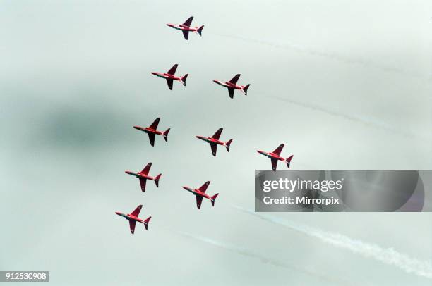 The Red Arrows, RAF Aerobatic Team, performing at the 1993 500 CC British Motorcycle Grand Prix, Donington Park, 1st August 1993.