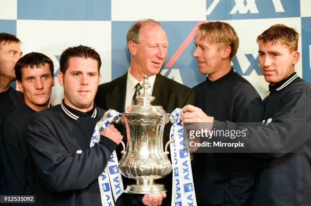 Jackie Charlton and the Ashington football team with the AXA FA Cup. Jack chats to captain Mickey Bell, 1st September 1998.